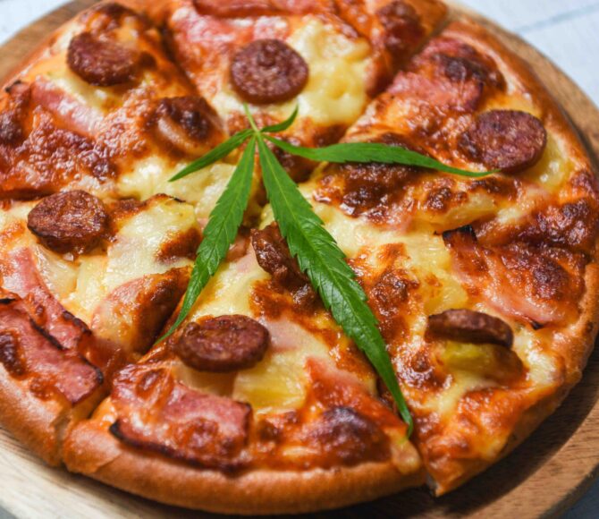 cannabis food withPizza on wooden tray and chilli basil leaf top view / delicious tasty fast food italian traditional pizza cheese